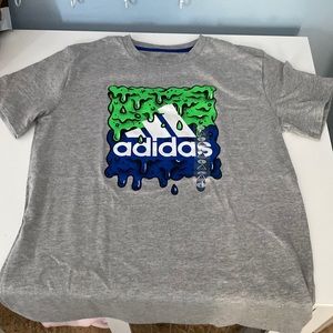 New with tag, Adidas graphic T-shirt, dark blue and green primary colors on gray